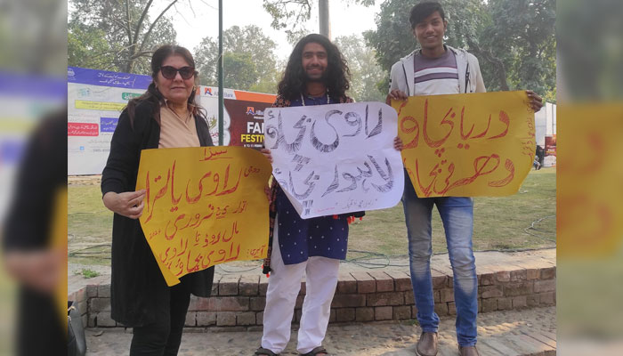 In this image Ravi Bachao Tehreek supporters hold placards. — Facebook@Ravi Bachao Tehreek/File