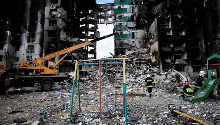 A rescuer walks during a search operation for bodies under the rubble of a building destroyed by Russian shelling, amid Russias invasion of Ukraine, in Borodyanka, Kyiv region, Ukraine April 11, 2022.—Reuters