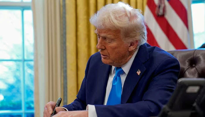US President Donald Trump signs a document in the Oval Office at the White House in Washington, US February 4, 2025. — Reuters