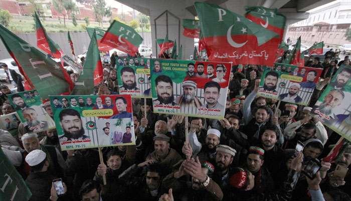PTI activists protest demonstration for release of PTI Founder Imran Khan, outside KP Assembly in Peshawar on February 25, 2025. — PPI