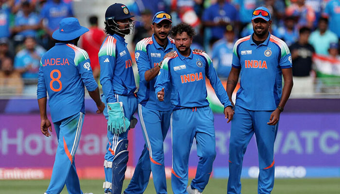 India’s Kuldeep Yadav (second right) celebrates after taking the lbw wicket of Pakistan’s Shaheen Shah Afridi. — Reuters