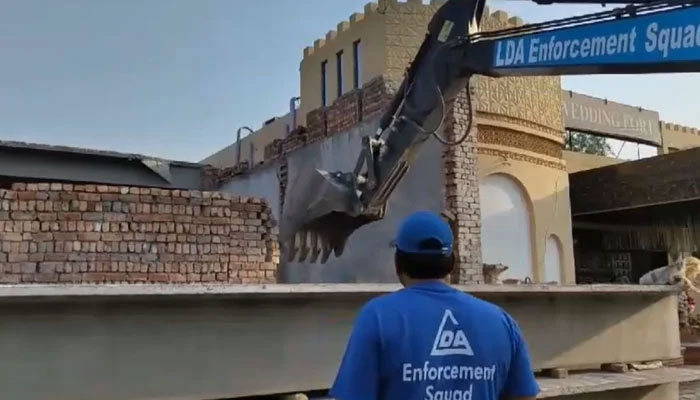 Lahore Development Authority teams conduct a special operation against illegal constructions and commercialisation fee defaulters on June 24, 2024. — Screengrab via Facebook@Lahore Development Authority