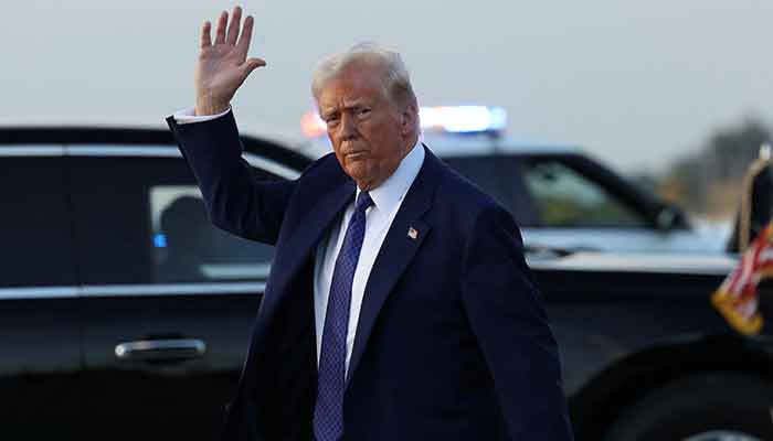 US President Donald Trump waves upon arrival in West Palm Beach, Florida, US, February 14, 2025. — Reuters