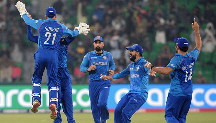 Afghanistan players celebrate the wicket of “Phil Salt by Azmatullah Omarzai” during the ICC Champions Trophy one-day international (ODI) cricket match between Afghanistan and England at the Gaddafi Stadium, February 26, 2025.— APP