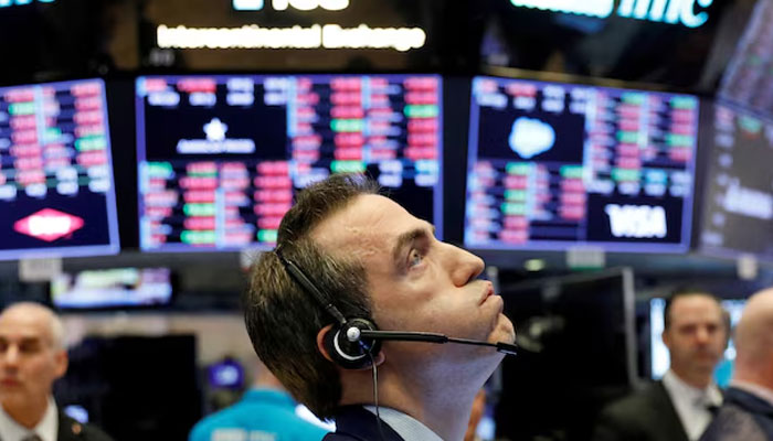 A trader works on the floor of the New York Stock Exchange shortly before the closing bell as the market takes a significant dip in New York, US, February 25, 2020. —Reuters
