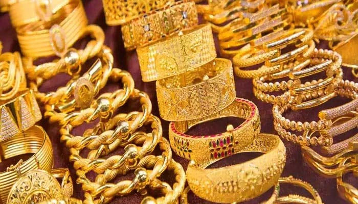 A representational image of gold bangles. — Reuters
