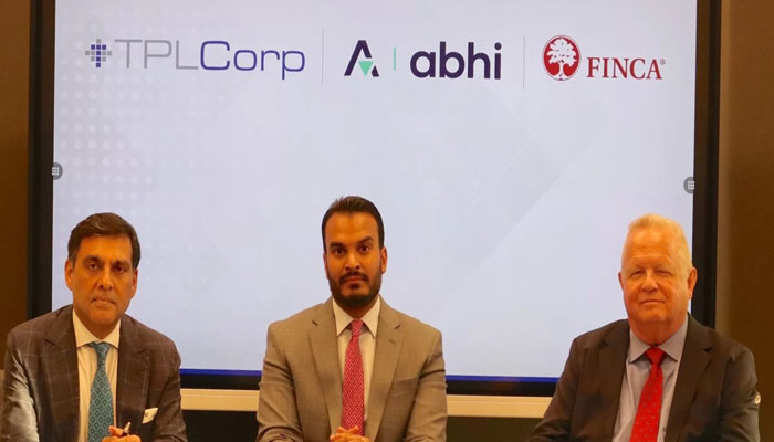 Officials of ABHI and TPL Corp Limited posing for photo. —Facebook@abhimicrofinance/File