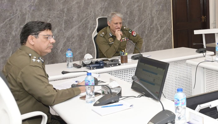 Inspector General of Police Punjab Dr Usman Anwar (right) chairs a meeting on February 27, 2025. — Facebook@PunjabPolicePakistanOfficial
