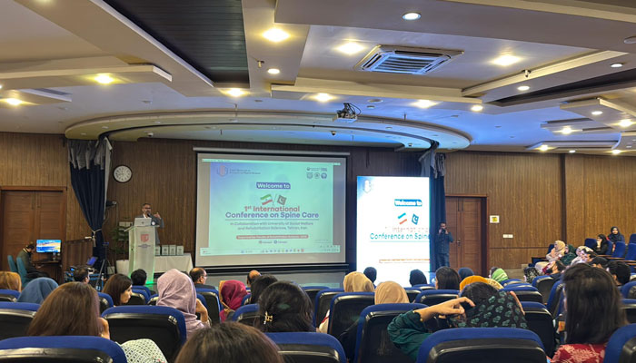 A participant delivers a lecture at the first International Spine Care Conference on February 27, 2025. — Facebook@Faizan Hamid