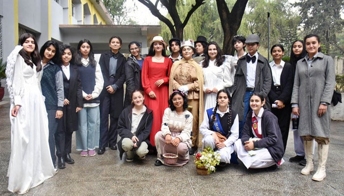Students pose for a group photo in the intercollegiate English Drama competition titled The stories from the Victoria Era at IMCG F7/2 in Islamabad on February 27, 2025. — APP