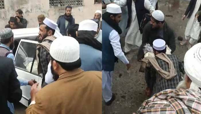 People trying to shift affectees after a blast ripped through Darul Uloom Haqqania, Akora Khattak, Nowshera, on February 28, 2025. — Geo News