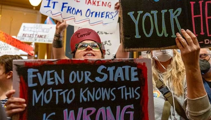 A person protesting against a bill in Iowa.— Reuters/File