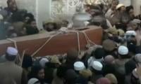 JUI-S chief laid to rest as thousands, including Afghan diplomat, attend funeral