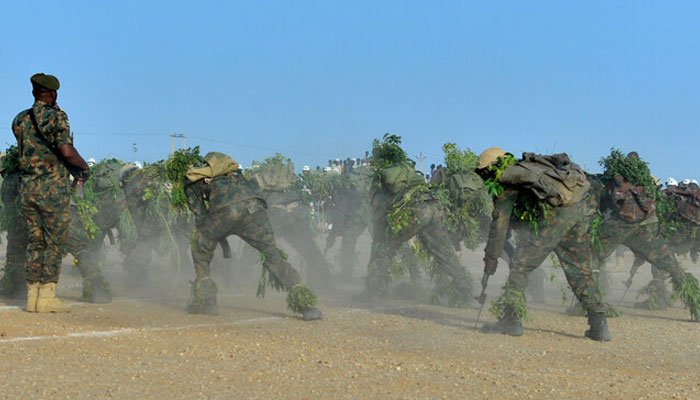 Newly graduated Sudanese army soldiers show their skills during a ceremony in Merowe in northern Sudan on February 27, 2025.—AFP