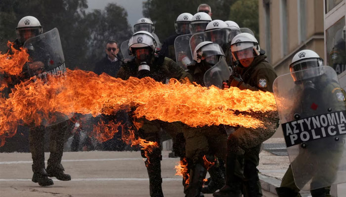 A Molotov cocktail ignites, striking a riot police officer, at a protest near the Greek parliament, marking the second anniversary of the countrys worst railway disaster, while an investigation continues, in Athens, Greece, February 28, 2025. — Reuters