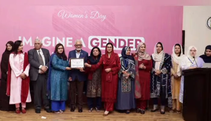 Former health minister Prof Dr Javed Akram (5th left) in a group photo at the International Women’s Day celebration under the auspices of the Medical Women Association of Pakistan (MWAP) on March 1, 2025. — Screengrab via Facebook@Dr. Wajiha Rizwan