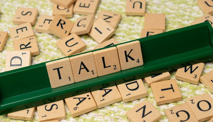 This representational image shows scrabble blocks alphabets spells TALK. —  Unsplash