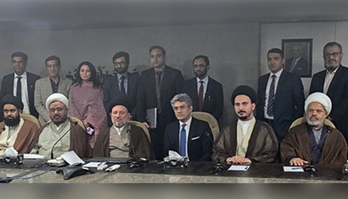 This handout photograph shows Pakistan Stock Exchange officials pose for a group photo along with the delegation of Iraq’s Scientific Foundation for Financial Transactions in Karachi on March 4, 2025. —APP