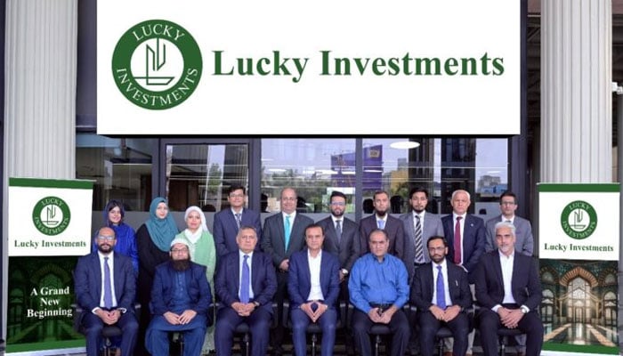 Lucky Investment officials posing for photo after inauguration of their new office at the Finance and Trade Centre, March 4, 2025. —APP