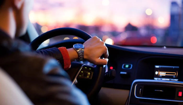 A representational image of a man driving. — Unsplash/File