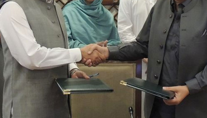 This representational image shows officials shaking hands after signing an agreement. — pndkp.gov.pk/File