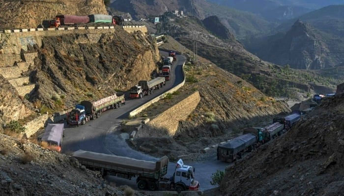 Representational image shows trucks parked along a road near the Pakistan-Afghanistan border in Torkham, on September 11, 2023, — AFP