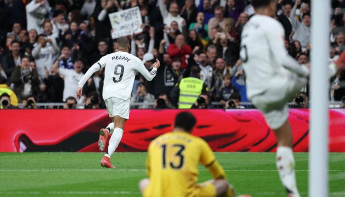Kylian Mbappe (right) celebrates scoring the opening goal against Rayo Vallecano. —AFP/File