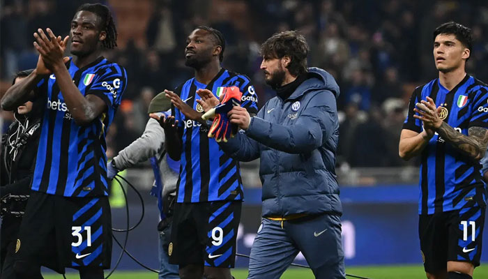 Inter Milan’s players celebrate their victory at the end of the Italian Serie A football match between Inter Milan and Monza at the San Siro stadium in Milan, on March 8, 2025.— AFP