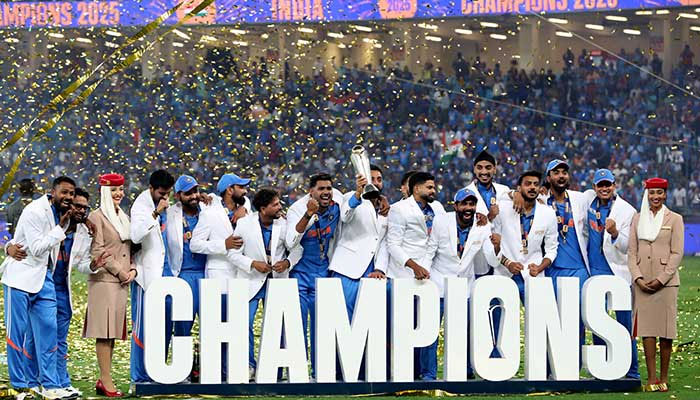 India players pose for a photo with the trophy as they celebrate winning the ICC Mens Champions Trophy at Dubai International Stadium, Dubai, United Arab Emirates, March 9, 2025. — Reuters
