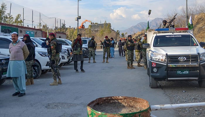 Frontier Constabulary and army personnel gather near the ambushed region in Kurram, northwest Pakistan on January 17, 2025. — AFP