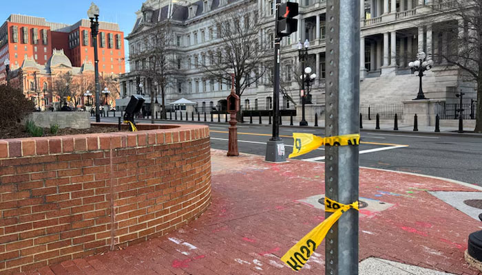 Police tape remains at the scene of an overnight shooting on a street bordering the White House complex, after Secret Service say they shot a man brandishing a firearm in Washington, DC, US March 9, 2025.— Reuters