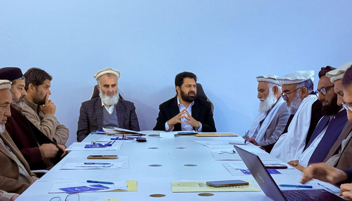 Former senior provincial minister and head of Jamaat-e-Islami KP (North) Inayatullah Khan (centre right) speaks at a meeting of Jamaat-e-Islami’s provincial executive council on March 10, 2025. — Facebook@inayatullahkhanofficial