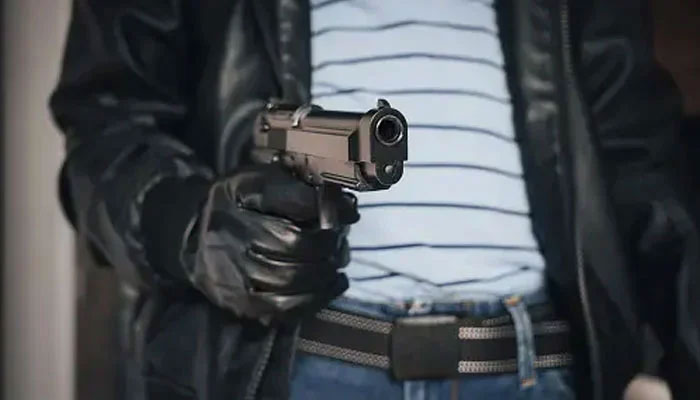 This representational image shows a man showing a gun. — Unsplash/File