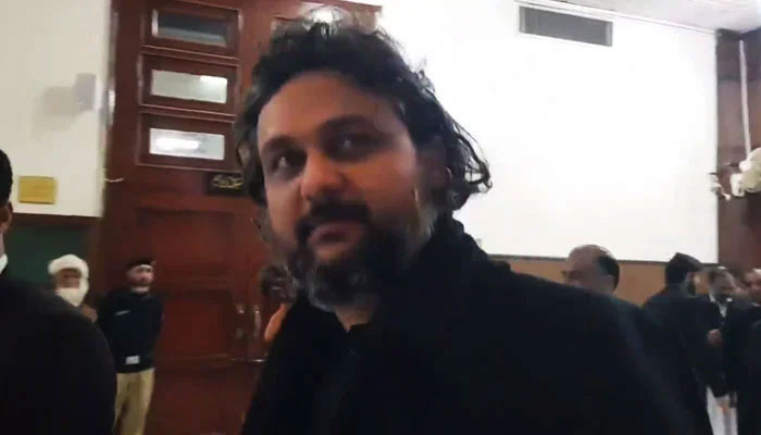 PTI leader Faisal Javed speaks to reporters in Peshawar on February 19, 2024, in this still taken from a video. — Screengrab via YouTube/Geo News