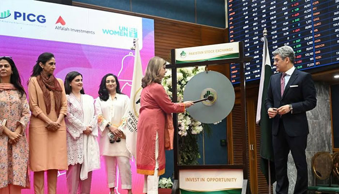 A participant ringing bell on womens day, March 10, 2025. —Facebook@Pakistanstockexchangelimited