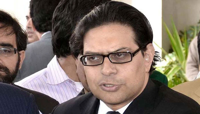 Pakistan Tehreek-e-Insaf leader Salman Akram Raja talks to journalists. — INP/File