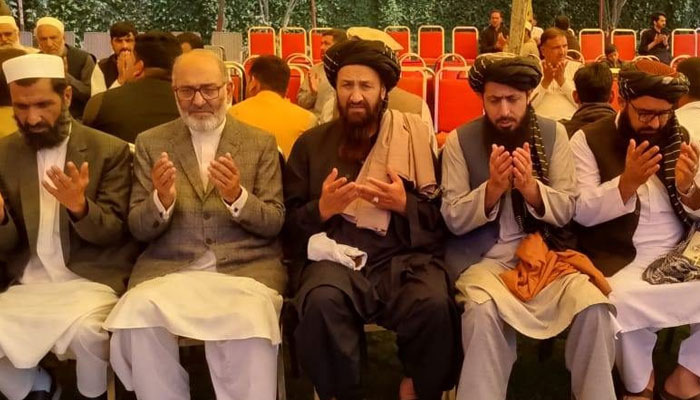 Afghan Consul General Hafiz Mohibullah (centre), along with a delegation, offers fateha for departed soul of former senator Mushtaq Ahmad Khan’s brother at his residence on March 11, 2025. — Facebook@MushtaqAhmadKhanOfficial