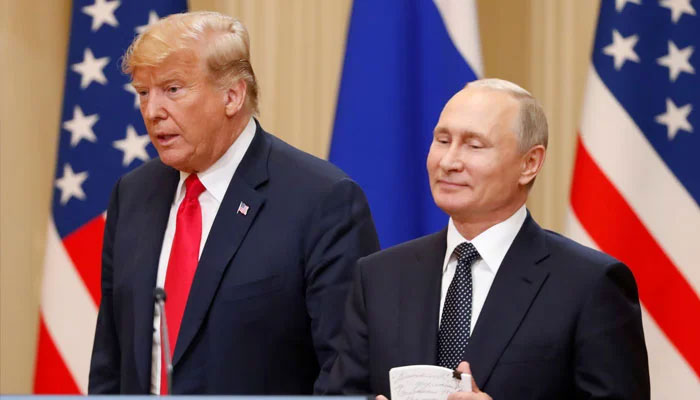 US President Donald Trump (left) and his Russian counterpart President Putin arrive for a joint news conference. — Reuters/File