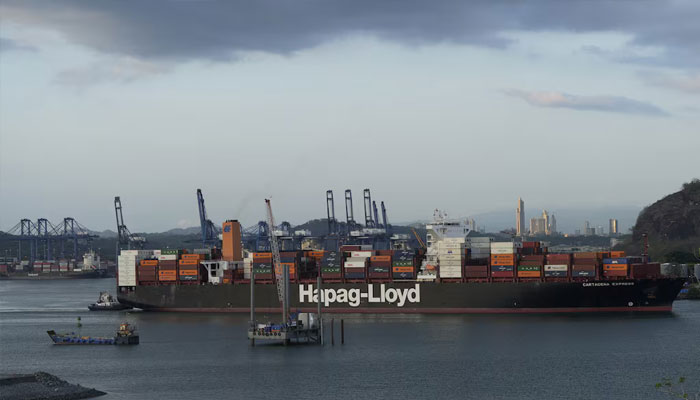 A cargo ship sails through the Panama Canal next to the entrance of the Balboa Port, in Panama City, Panama, March 13, 2025. — Reuters