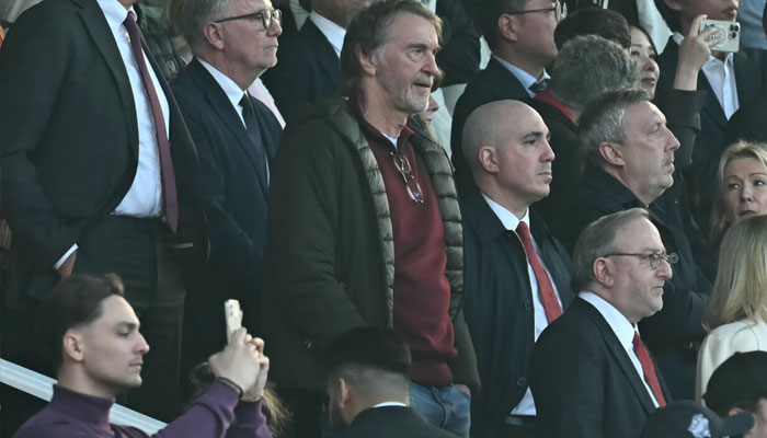 Manchester Uniteds co-owner Jim Ratcliffe (centre) watching the match. —AFP/File