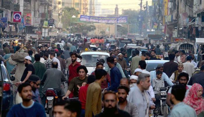People are busy in buying food items at Burns road in Karachi on March 10, 2025. — PPI