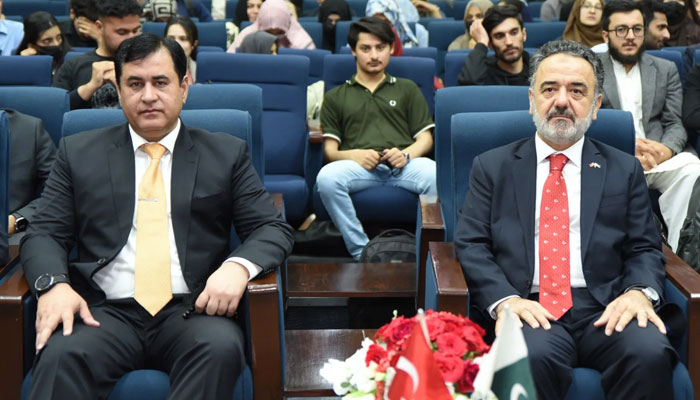 Dr. Jameel Asghar Jami, Dean of the Faculty of Languages and Irfan Neziro lu, Ambassador of the Turkish Embassy in Pakistan (right).— Facebook@NUML.official/File