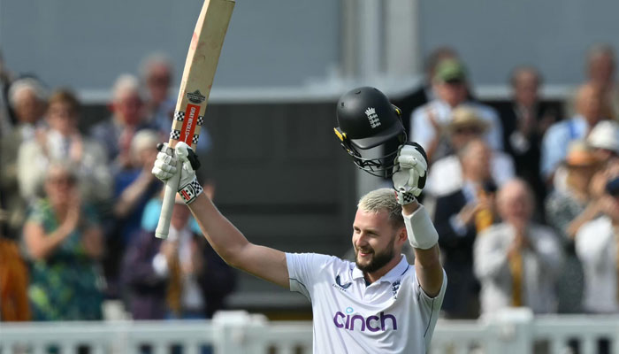 Englands Gus Atkinson celebrates reaching his hundred against Sri Lanka in the second Test at Lords.—AFP/File