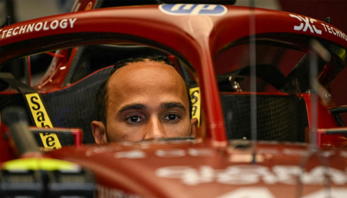Lewis Hamilton of Ferrari seen in his car.— AFP/File