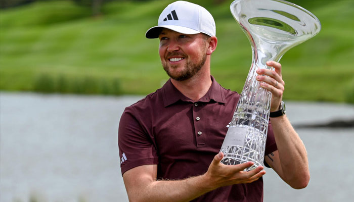 Englands Richard Mansell posing with trophy. —AFP/File