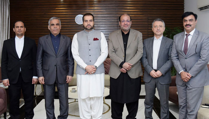 Provincial Minister for Industries and Commerce Chaudhry Shafay Hussain (centre right) and Provincial Minister for Agriculture and Livestock Syed Ashiq Hussain Kirmani (centre left) in a group photo during their visit to the Iranian Consulate on March 25, 2025. — Facebook@Syed.Ashiq.Kirmani