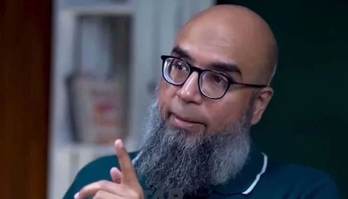 In this undated image, journalist Farhan Mallick speaks during an interview. — X@raftar/File