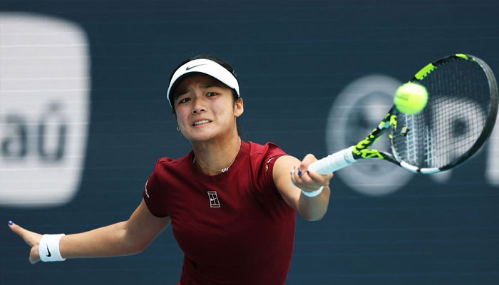 Alexandra Eala of the Philippines returns a shot against Iga Swiatek of Poland during their matchon Day 9 of the Miami Open at Hard Rock Stadium on March 26, 2025 in Miami Gardens, Florida. —AFP