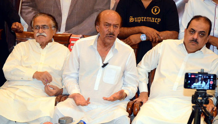 Pakistan Peoples Party (PPP) Sindh President Nisar Khuhro (centre) along with Mola Bux Chandio (left) addresses to media persons during press conference, at Qasimabad in Hyderabad on March 27, 2025. — PPI