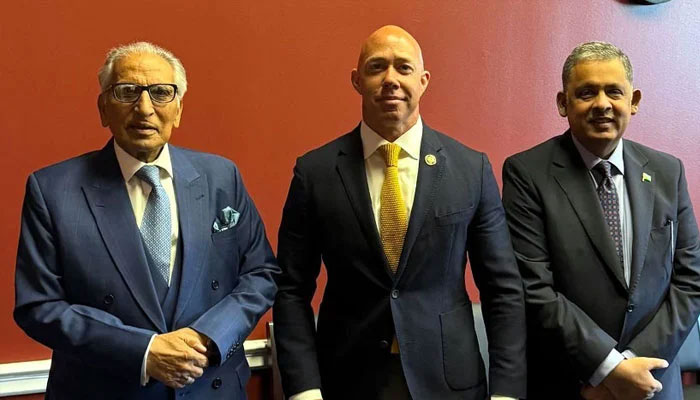 Special Assistant to the Prime Minister Syed Tariq Fatemi (left) poses for a photo during his US visit. —Radio  Pakistan/File